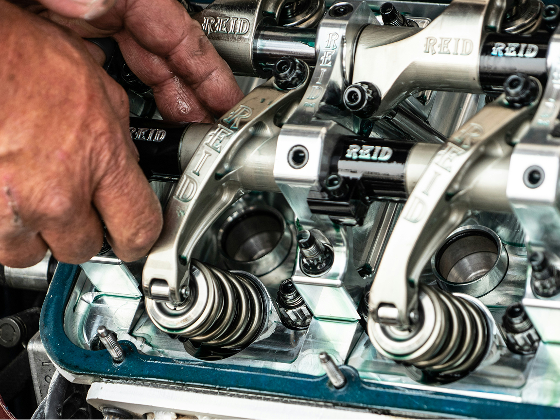 Mechanic working on European vehicle parts