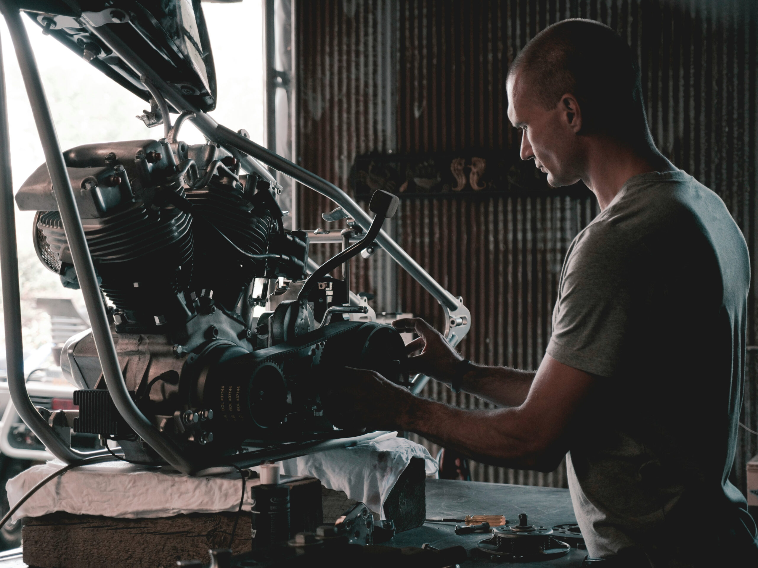 Mechanic diagnosing European vehicle parts